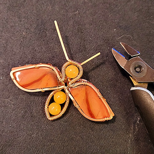 Jennifer Brooks's Rosy Maple Moth Pendant - , Contemporary Wire Jewelry, Lashing, Wire Lashing, Wire Wrapping, Wrapping, Wire Wrapping Jewelry, Trim antennas